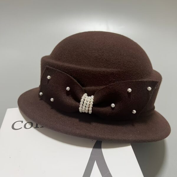 Newness Wintertide Pearl Wool Bucket Hat: Luxurious wool bucket hat with delicate pearl accents, perfect for adding a touch of elegance to your winter wardrobe.