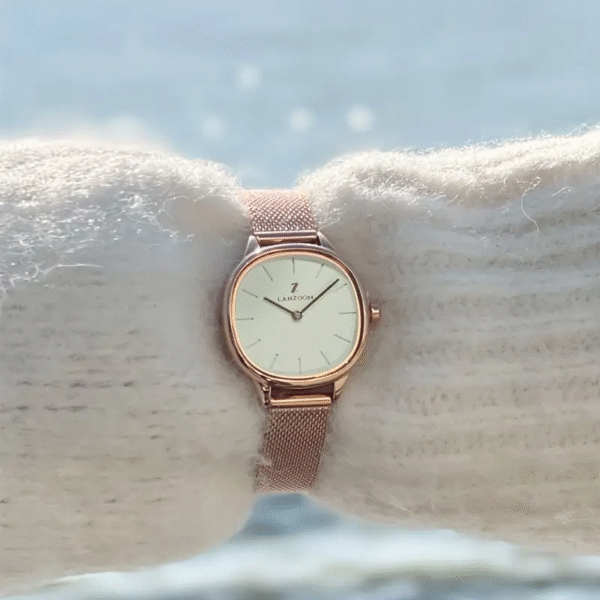 Sleek minimalist women's stainless steel watch by Newness. Features a simple, elegant design perfect for everyday wear.