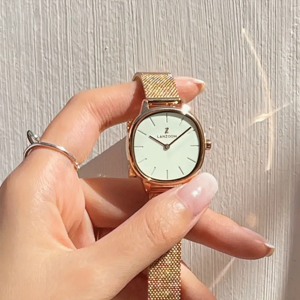 Sleek minimalist women's stainless steel watch by Newness. Features a simple, elegant design perfect for everyday wear.