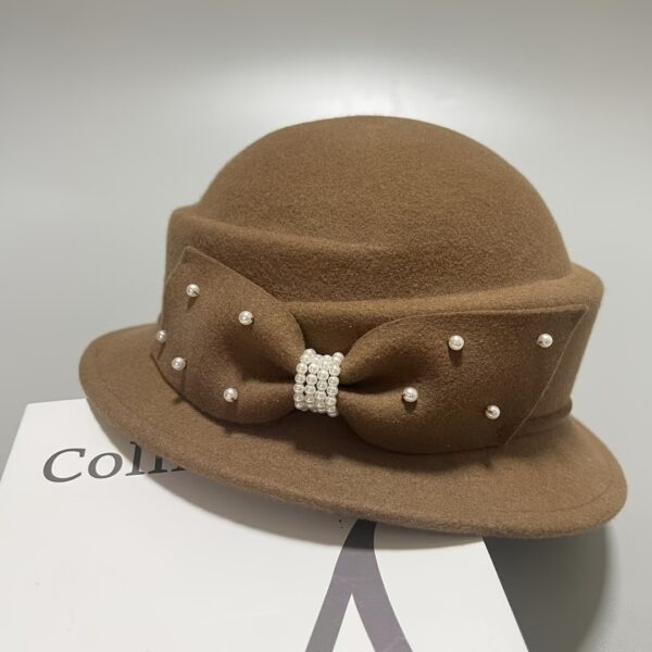 Newness Wintertide Pearl Wool Bucket Hat: Luxurious wool bucket hat with delicate pearl accents, perfect for adding a touch of elegance to your winter wardrobe.