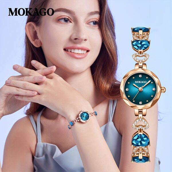 MKGO Blue Crystal Heart Watch for Women, close-up showcasing blue crystal heart bracelet and watch face details.