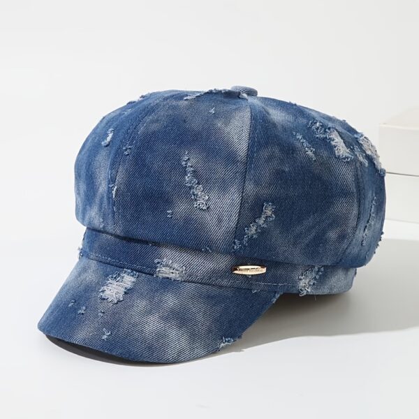 Newness Parisian Nights Distressed Suede Beret: A stylish, dark-toned suede beret with a distressed finish, adding Parisian chic to any outfit.