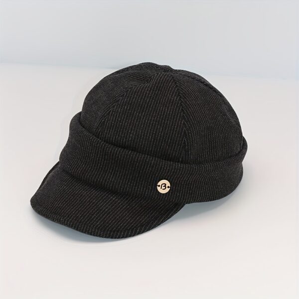 Stylish Newness Boulevard Newsboy Cap in winter setting. A close-up shows the texture and details of the warm, chic cap.