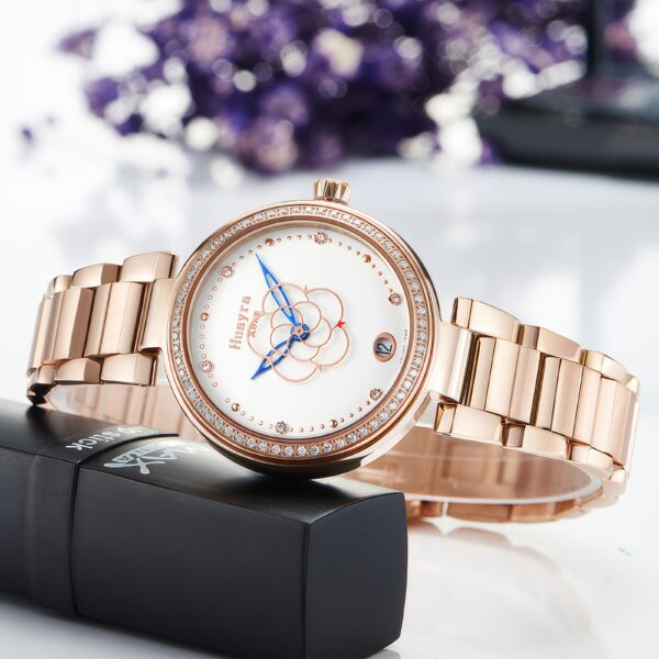 Celestial Bloom Women's Automatic Watch showcasing floral details and intricate watch mechanism.