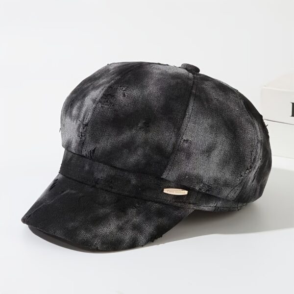 Newness Parisian Nights Distressed Suede Beret: A stylish, dark-toned suede beret with a distressed finish, adding Parisian chic to any outfit.