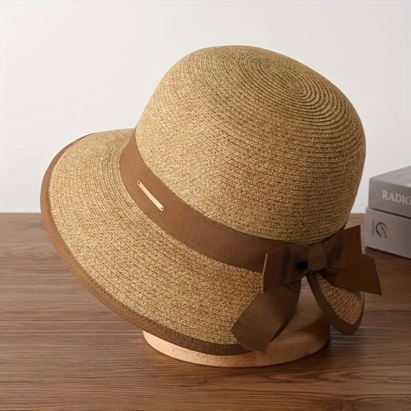 Stylish woman wearing a Newness Riviera Escape Women's Summer Fedora, a breathable and chic sun hat, perfect for a summer getaway.