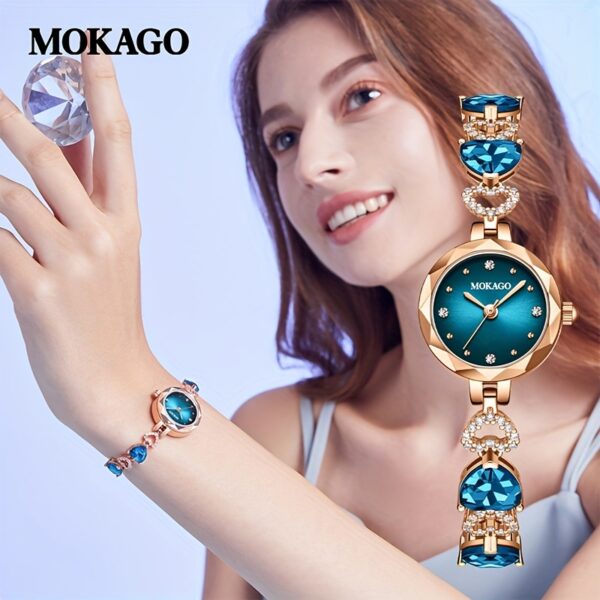 MKGO Blue Crystal Heart Watch for Women, close-up showcasing blue crystal heart bracelet and watch face details.