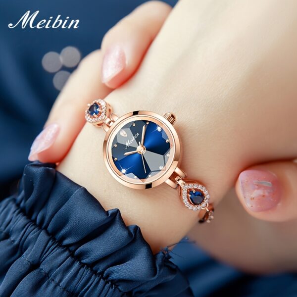 Newness Celestial Dusk Women's Rose Gold Watch: A sophisticated rose gold watch, perfect for any occasion.