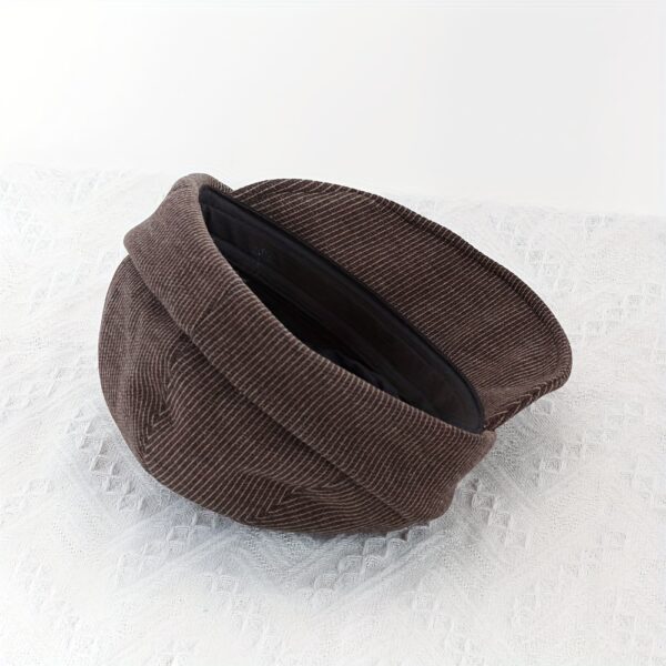 Stylish Newness Boulevard Newsboy Cap in winter setting. A close-up shows the texture and details of the warm, chic cap.