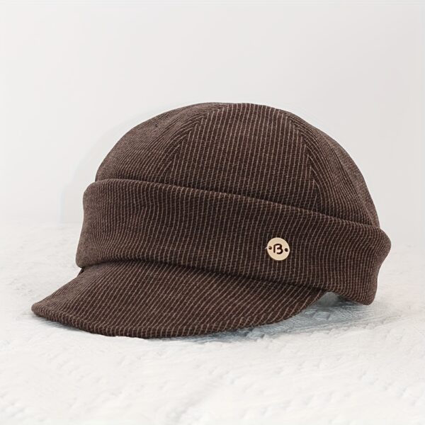 Stylish Newness Boulevard Newsboy Cap in winter setting. A close-up shows the texture and details of the warm, chic cap.