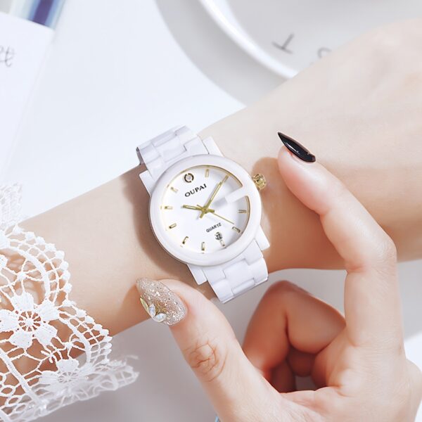 Close-up of the OUPAI Celestial White Ceramic Quartz Watch, showcasing its elegant design and white ceramic band.