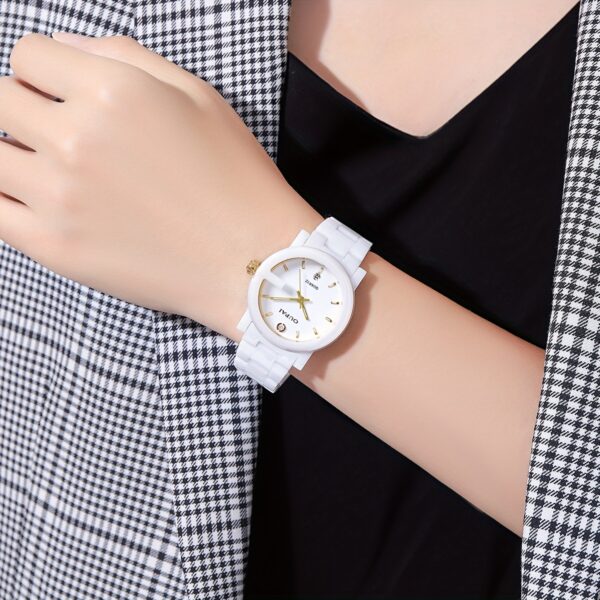 Close-up of the OUPAI Celestial White Ceramic Quartz Watch, showcasing its elegant design and white ceramic band.
