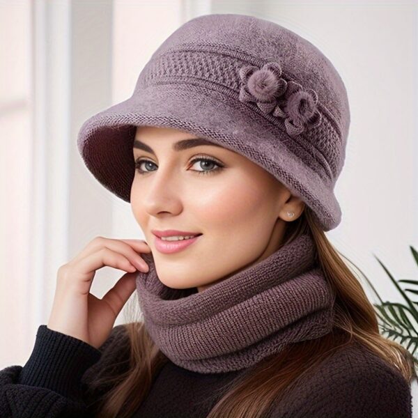 Stay cozy and chic this winter with the Newness Vienna Nights Floral Winter Hat. Featuring a beautiful floral design, this hat is perfect for winter outings and holiday gatherings.