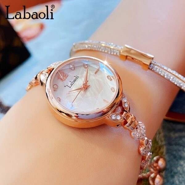 Labaoli Women's Wrist Watch LA062L: Close-up showcasing the rhinestone dial and steel strap of a fashionable quartz watch.