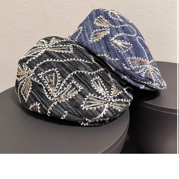 Newness Midnight Bloom Embroidered Beret in blue and black floral denim with golden accents. Lightweight, stylish, and perfect for streetwear.