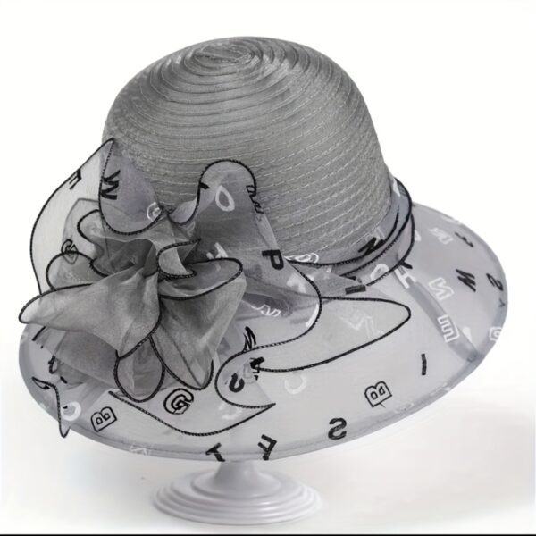 Stylish Newness Riviera Escape Summer Bucket Hat in a vibrant color, showcasing its breathable fabric and adjustable design. Perfect for sunny days.