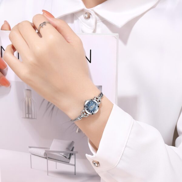 Newness Celestial Dusk Women's Chain Bracelet Watch: A stunning chain bracelet watch with a sophisticated design, perfect for any occasion.