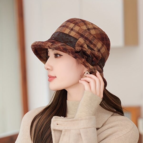 Stylish Newness Autumn Stroll Plaid Bucket Hat in fall colors, perfect for adding a touch of chic to any autumn outfit.