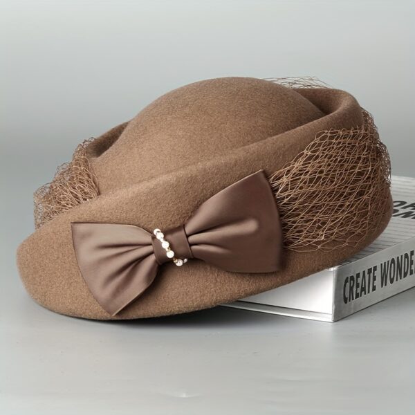 Close-up of the Newness Étoile Wool Beret Hat, showcasing its texture and rich wool material. The beret is a classic style in a versatile color.