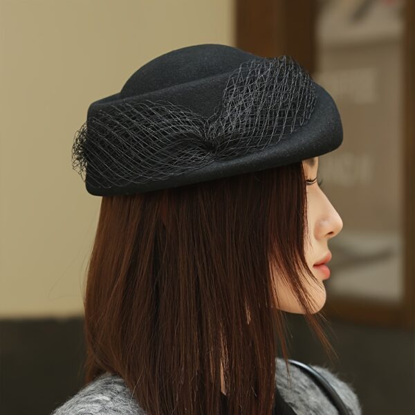 Close-up of the Newness Étoile Wool Beret Hat, showcasing its texture and rich wool material. The beret is a classic style in a versatile color.