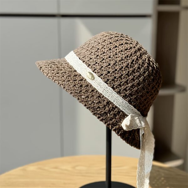 Stylish Newness Summer Breeze Crochet Bucket Hat in white, worn by a model. Perfect for sunny days.