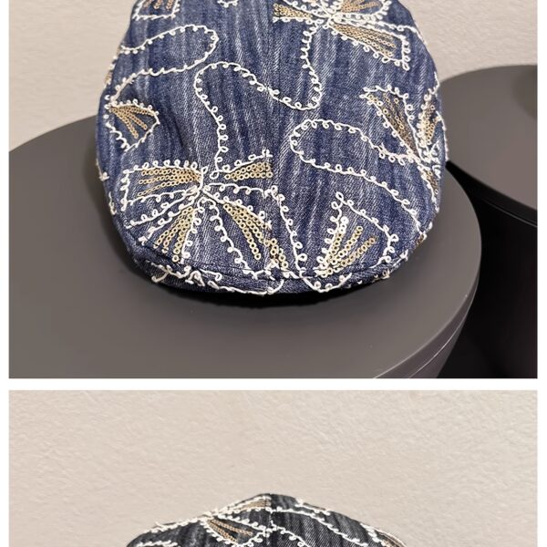 Newness Midnight Bloom Embroidered Beret in blue and black floral denim with golden accents. Lightweight, stylish, and perfect for streetwear.