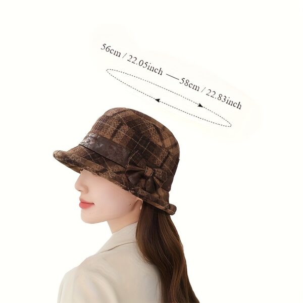 Stylish Newness Autumn Stroll Plaid Bucket Hat in fall colors, perfect for adding a touch of chic to any autumn outfit.