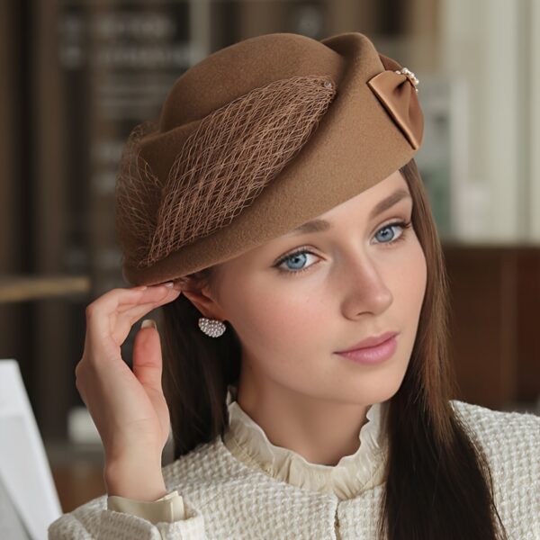 Close-up of the Newness Étoile Wool Beret Hat, showcasing its texture and rich wool material. The beret is a classic style in a versatile color.