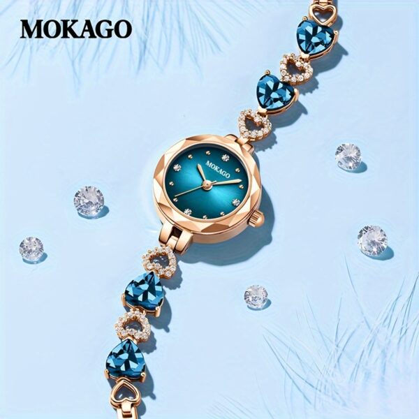 MKGO Blue Crystal Heart Watch for Women, close-up showcasing blue crystal heart bracelet and watch face details.
