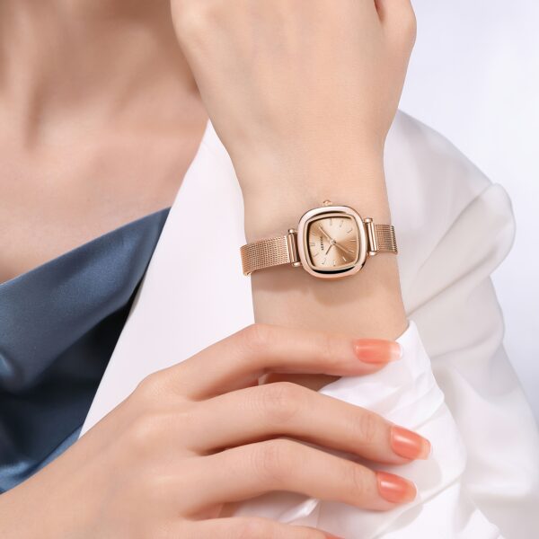 Rose Gold Square Quartz Watch by Newness. A minimalist, square-faced watch with a rose gold finish.