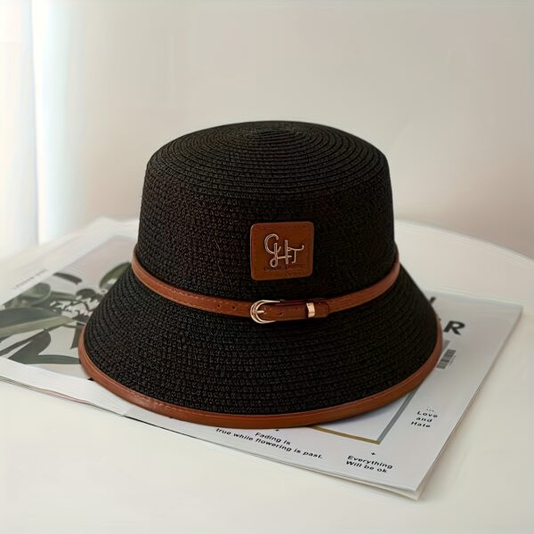 Stylish Newness Riviera Escape Straw Bucket Hat, perfect for summer adventures. Lightweight and versatile, in a natural straw color.