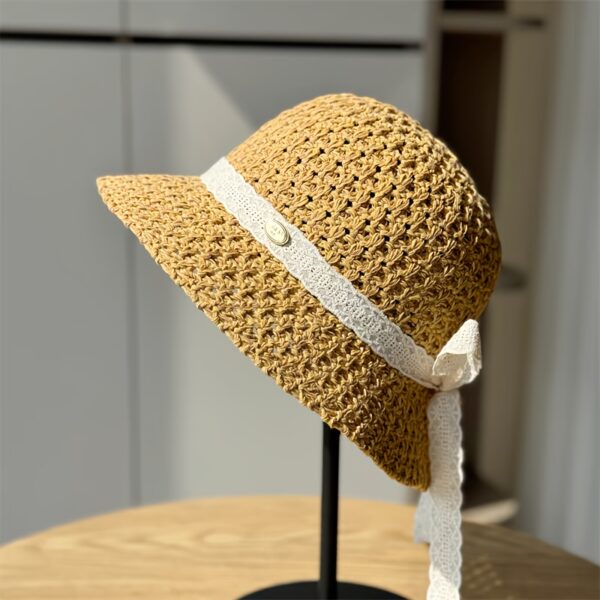 Stylish Newness Summer Breeze Crochet Bucket Hat in white, worn by a model. Perfect for sunny days.