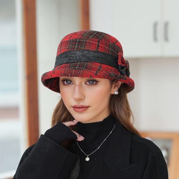 Stylish Newness Autumn Stroll Plaid Bucket Hat in fall colors, perfect for adding a touch of chic to any autumn outfit.