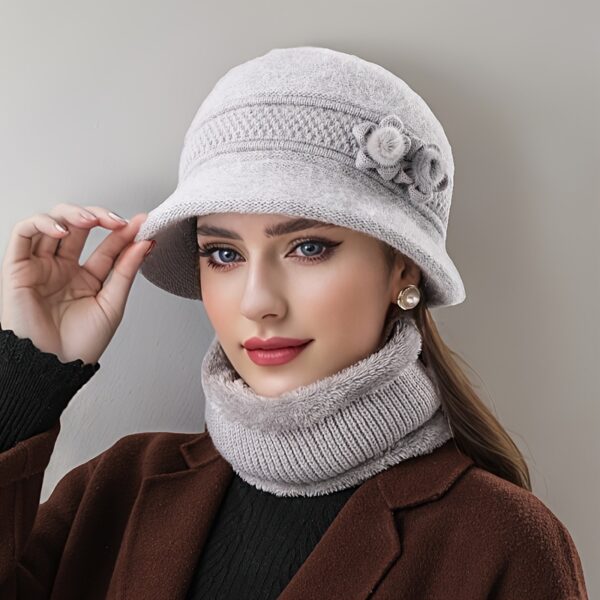 Stay cozy and chic this winter with the Newness Vienna Nights Floral Winter Hat. Featuring a beautiful floral design, this hat is perfect for winter outings and holiday gatherings.