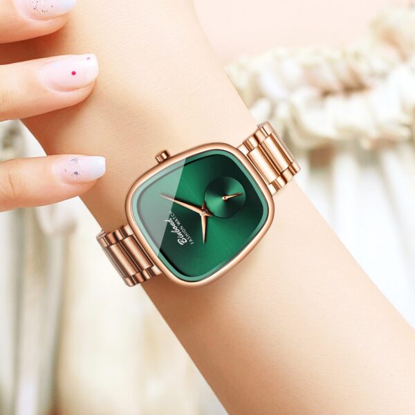 BINBOND Emerald Elegance Luxury Quartz Watch: A chic, minimalist wristwatch with an emerald green face.