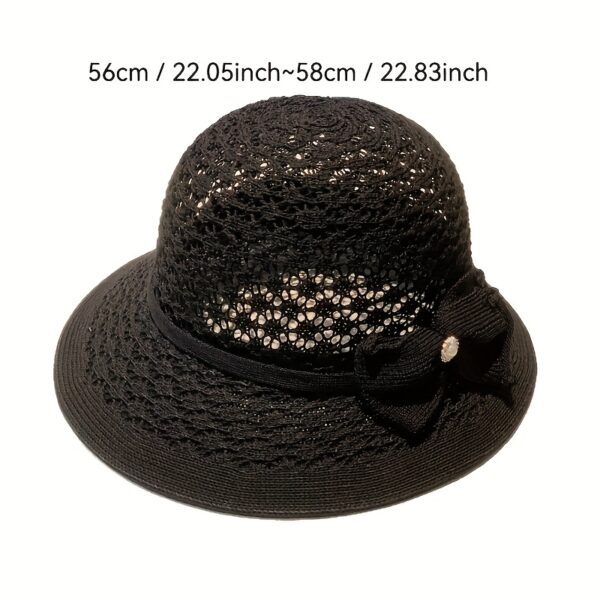 The Newness Riviera Straw Bucket Hat: A stylish and protective straw hat, perfect for summer. Breathable and lightweight, ideal for sunny adventures.