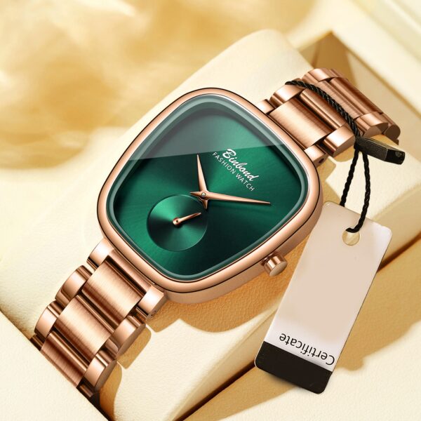 BINBOND Emerald Elegance Luxury Quartz Watch: A chic, minimalist wristwatch with an emerald green face.