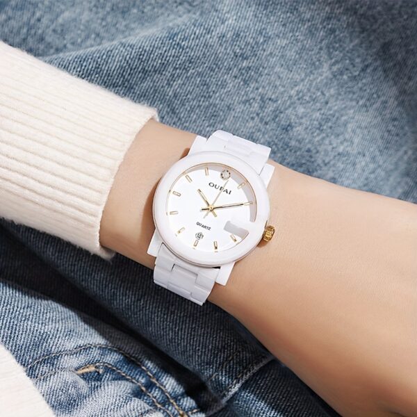Close-up of the OUPAI Celestial White Ceramic Quartz Watch, showcasing its elegant design and white ceramic band.