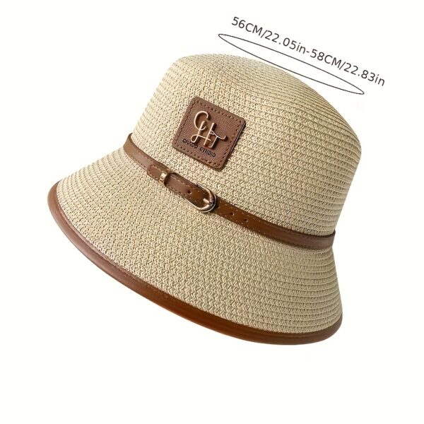 Stylish Newness Riviera Escape Straw Bucket Hat, perfect for summer adventures. Lightweight and versatile, in a natural straw color.