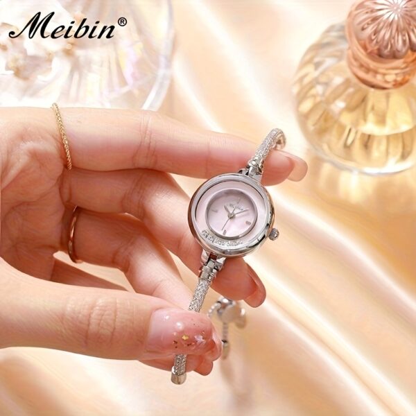 Celestial Sparkle Crystal Accent Watch: A glamorous timepiece adorned with sparkling crystals, perfect for any occasion.