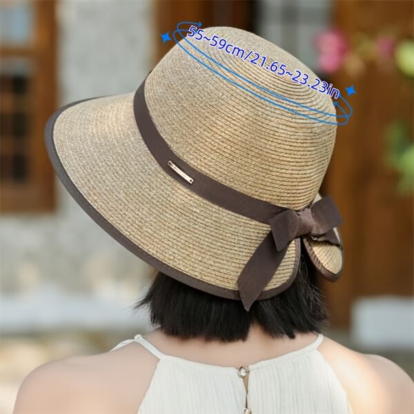 Stylish woman wearing a Newness Riviera Escape Women's Summer Fedora, a breathable and chic sun hat, perfect for a summer getaway.