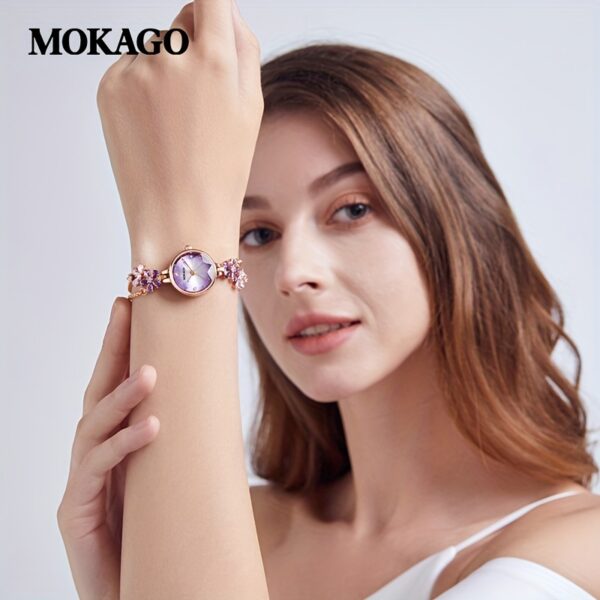 Newness Violet Bloom Crystal Bracelet Watch: A stunning violet watch with sparkling crystals on a delicate bracelet.