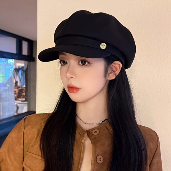 Stylish woman wearing a Newness Parisian Chic Wide Brim Beret showcasing its wide brim and chic design Perfect for any season