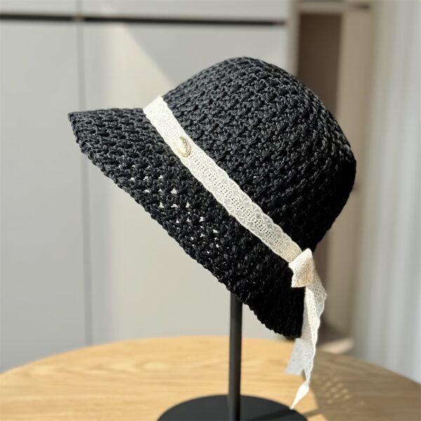 Stylish Newness Summer Breeze Crochet Bucket Hat in white, worn by a model. Perfect for sunny days.