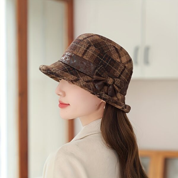 Stylish Newness Autumn Stroll Plaid Bucket Hat in fall colors, perfect for adding a touch of chic to any autumn outfit.