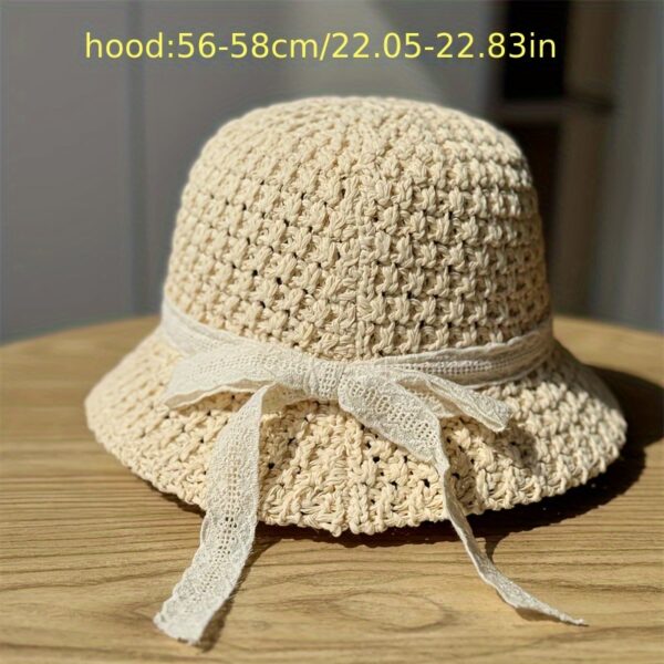 Stylish Newness Summer Breeze Crochet Bucket Hat in white, worn by a model. Perfect for sunny days.