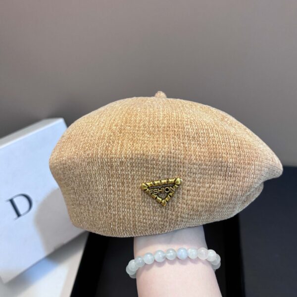 The Parisian Winter Beret Hat by Newness in a rich burgundy color, styled effortlessly with a classic autumn outfit.