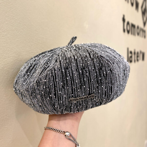 Elevate your style with the Newness Lumière Sparkling Beret Hat. This chic and modern accessory features a sparkling design, perfect for adding a touch of glamour to any outfit.