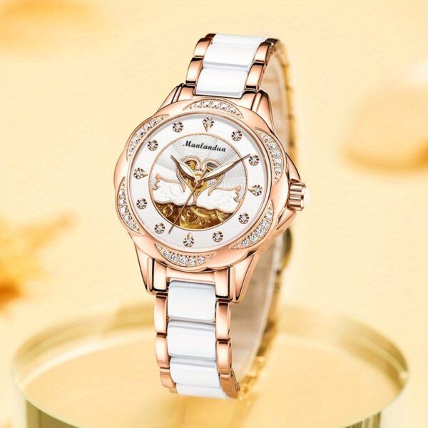 Newness Celestial Swan Rose Gold Quartz Watch with luminous hands and stainless steel band.