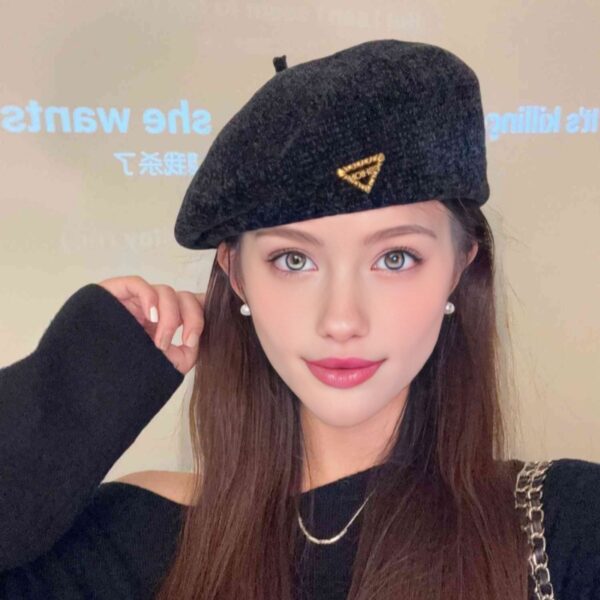 The Parisian Winter Beret Hat by Newness in a rich burgundy color, styled effortlessly with a classic autumn outfit.